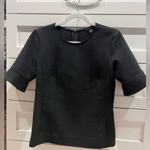 Ann Taylor, black structured top. Zipper down back. Size small